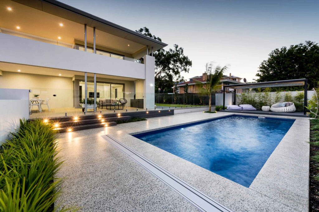 backyard with pool and concrete surround